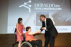 Marta Valencia, presidenta del CERMI Aragón, recoge el galardón