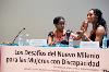Gennet Corcuera, joven activista sordociega, con su intérprete
