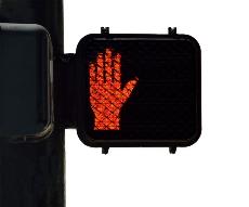 Señal de semáforo con una mano roja dando el alto