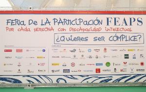 Cartel desplegado en la Cúpula del Milenio con la Feria de la Participación de FEAPS