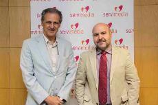Luis Cayo Pérez Bueno, presidente del CERMI, y José Manuel González Huesa, director de “cermi.es semanal” y director general de Servimedia