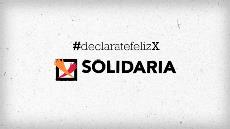 Cartel de la X Solidaria. Declárate feliz